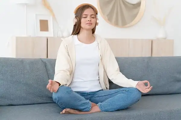 Meditating to relieve stress