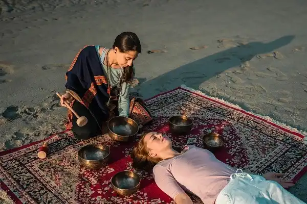 Sound healing session on the beach